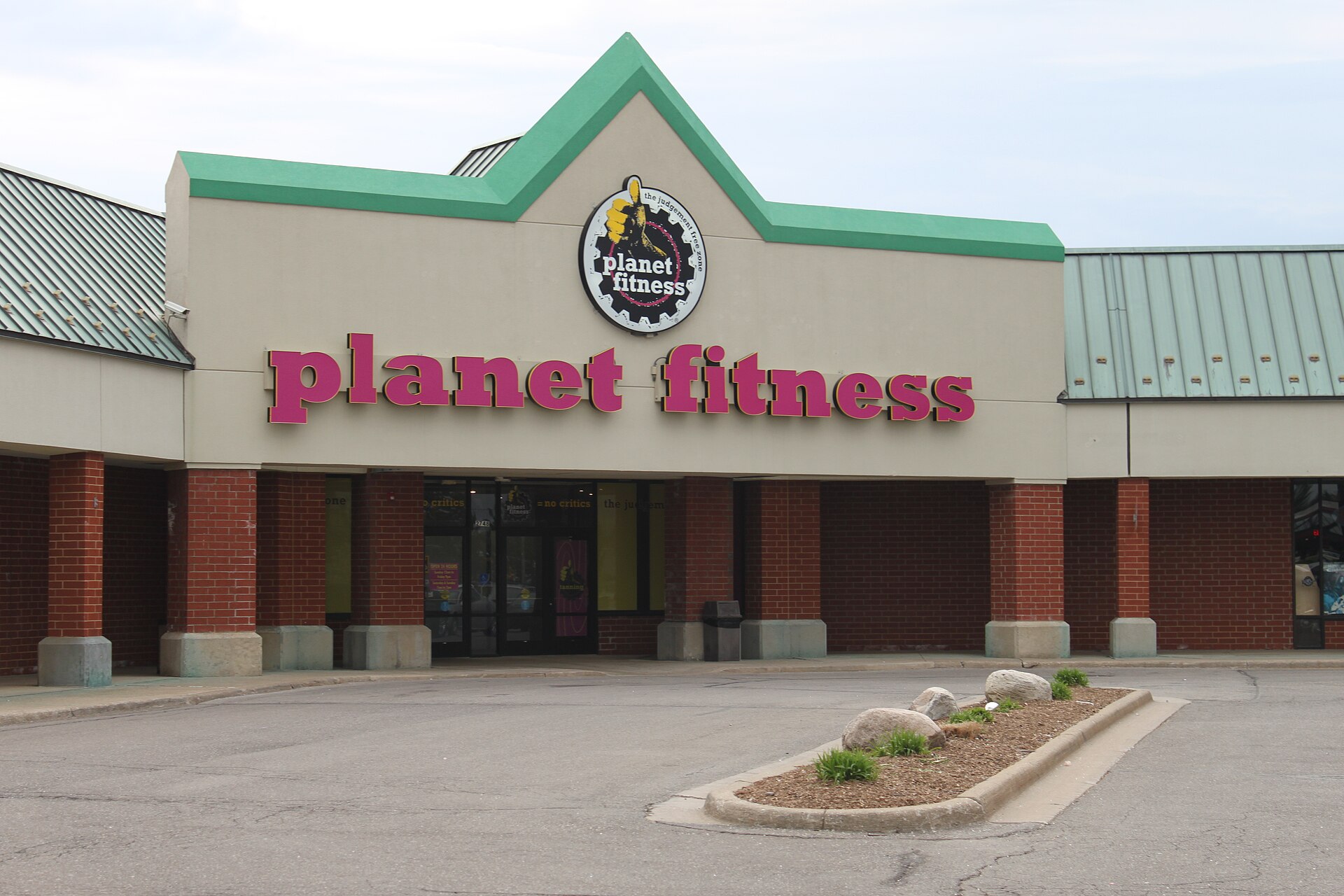 Imagem de referência relacionada a Planet Fitness, item descrito como rede de ginásios nos EUA