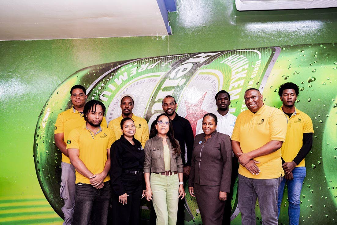 Dianne Ashton Smith, head of corporate affairs at Red Stripe (front centre), joins the WorldSkills Jamaica competitors and HEART/NSTA Trust executives during a visit to Red Stripe. The competitors are preparing to represent Jamaica at WorldSkills, a global