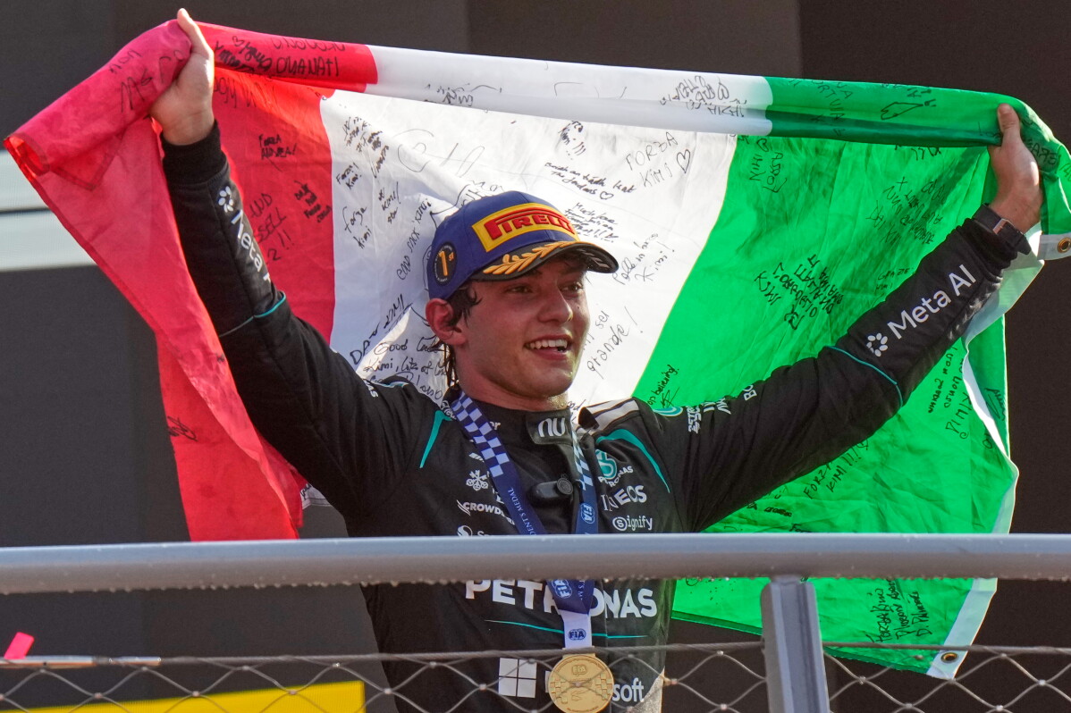 Mercedes driver Andrea Kimi Antonelli of Italy celebrates on the podium after winning the Italian Formula One Grand Prix race, in Monza, Italy, Sunday, Sept. 6, 2026. (AP Photo/Luca Bruno)